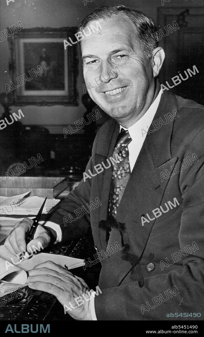 Named Secretary Of War--Kenneth C.Royall signs papers in his Pentagon office today after President Truman named him to succeed Robert P. Patterson as secretary of war. Royall now is undersecretary. July 18, 1947. (Photo by AP Wirephoto).
