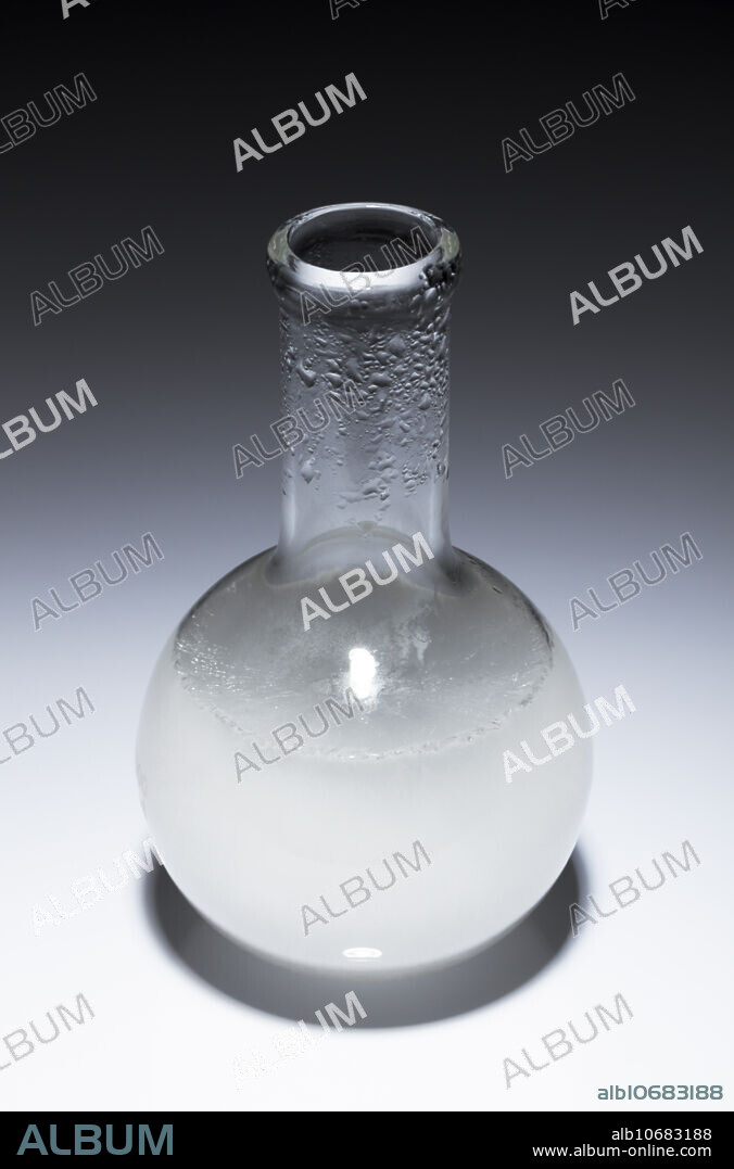 Crystallization of sodium acetate. When solid sodium acetate trihydrate (CH3COONa 3H2O) melts at 58C, it releases bound water (water of crystallization) and dissolves in it. When the solution is then allowed to cool slowly, it becomes supersaturated. When a nucleation centre (a small piece of solid sodium acetate) is introduced, it causes the solution to crystallize back into solid sodium acetate trihydrate. This process is exothermic and releases heat. It found its use in consumer heating pads.