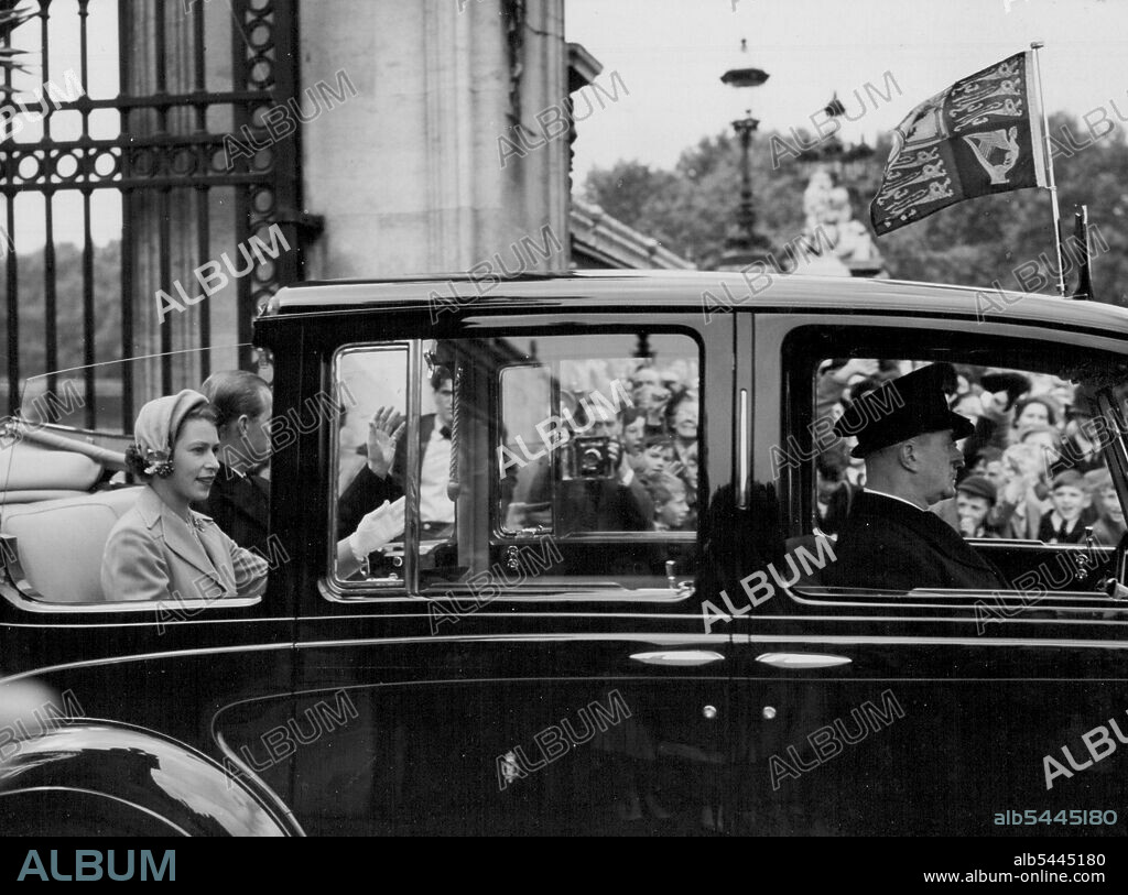 With Flag Flying... With the Royal standard fluttering over their car, Her Majesty the Queen and his Royal Highness the Duke of Edinburgh leave Buckingham Palace this afternoon for their drive through South-East London. June 8, 1953. (Photo by Paul Popper Ltd.).