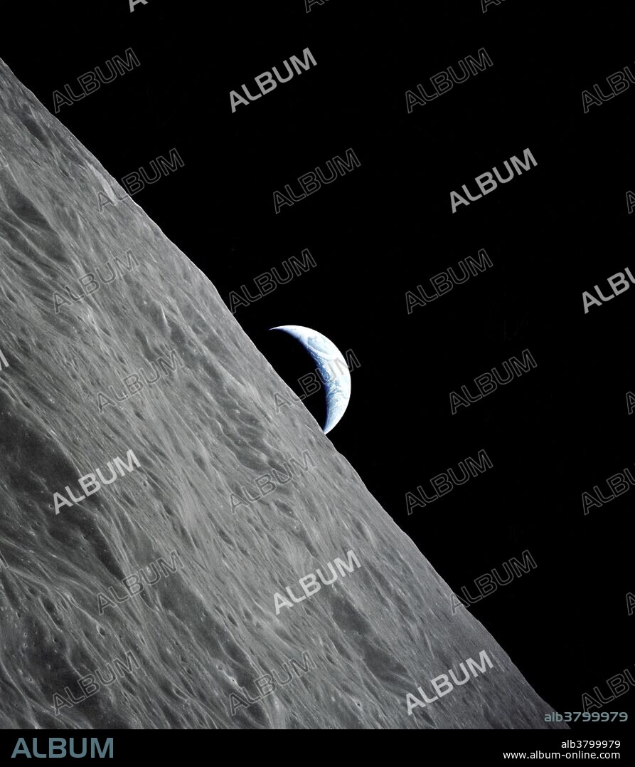 The crescent Earth rises above the lunar horizon in this photograph taken from the Apollo 17 spacecraft in lunar orbit during National Aeronautics and Space Administration's (NASA) final lunar landing mission in the Apollo program. While astronauts Eugene A. Cernan, commander, and Harrison H. Schmitt, lunar module pilot, descended in the Lunar Module (LM) "Challenger" to explore the Taurus-Littrow region of the moon, astronaut Ronald E. Evans, command module pilot, remained with the Command and Service Modules (CSM) "America" in lunar orbit.
