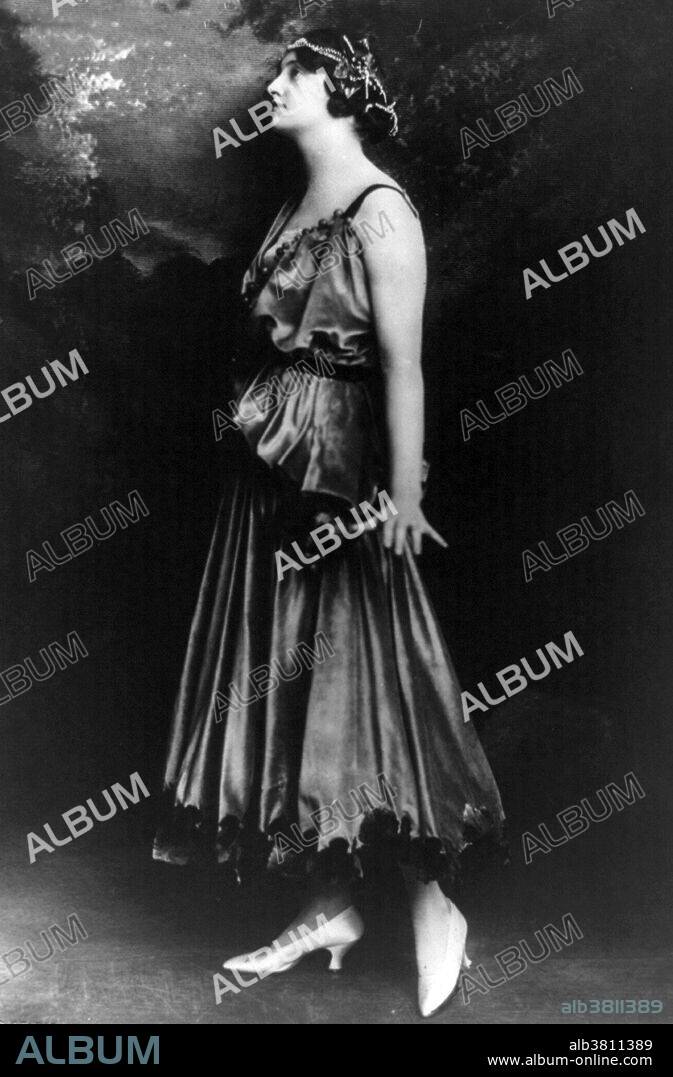 Jeanne Paquin (1869 - 1936) was a leading French fashion designer, known for her resolutely modern and innovative designs. She trained as a dressmaker at Rouff and later opened her own fashion house in 1891. The Maison Paquin quickly became known for its 18th century inspired pastel evening dresses and tailored day dresses, as well as for its numerous publicity stunts, including organizing fashion parades to promote her new models and sending her models to operas and races in order to show off her designs. An evening gown or gown is a long flowing women's dress usually worn to a formal affair.