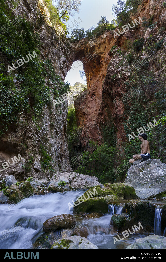 God's Bridge, hiker, Akchour, Talassemtane Nature Park, Rif region, morocco, africa.