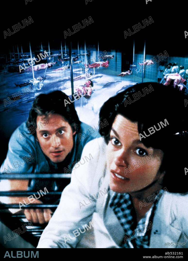 GENEVIEVE BUJOLD and MICHAEL DOUGLAS in COMA, 1978, directed by MICHAEL CRICHTON. Copyright M.G.M.