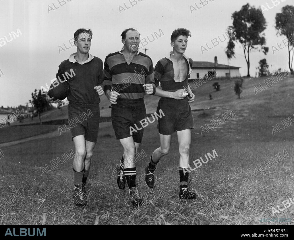 Bob Scott was the only member of the 1947 All Black side in Australia who neither drank nor smoked. He plays great attention to physical fitness and is a perfect model for all younger players to emulate. He has already been training for several weeks in preparation for the new season in Auckland. Here he jogs around Grey Lynn Park in the early hours  of the morning with his two protegees Doug Teague (left) and Archie Whorskey. What hundreds of other boys would give. to work out and be coached by this great football star! July 13, 1951.