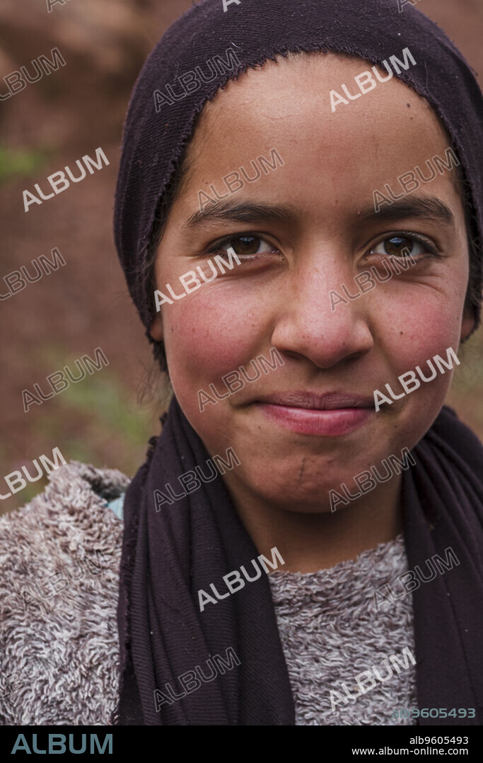 teenage berber girl with headscarf, Ait Blal, azilal province, Atlas mountain range, morocco, africa.