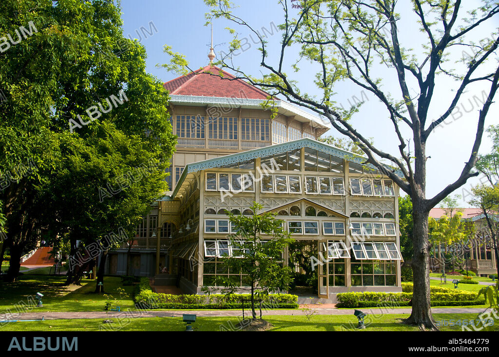 The Vimanmek Mansion is a former royal palace and is also known as the Vimanmek Teak Mansion or Vimanmek Palace. Vimanmek Mansion was built in 1900 by King Rama V (King Chulalongkorn) by having the Munthatu Rattanaroj Residence in Chuthathuj Rachathan at Ko Sichang, Chonburi, dismantled and reassembled in Dusit Garden. It was completed on March 27, 1901 and used as a royal palace by King Rama V for five years. In 1982 Queen Sirikit asked permission of King Rama IX (Bhumibol Adulyadej) to renovate Vimanmek Palace for use as a museum to commemorate King Rama V by displaying his photographs, personal art and handicrafts. The palace is the world's largest golden teakwood mansion.