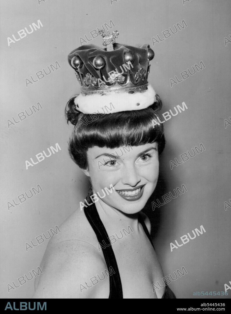 Coronation Hair-Style For A Countess -- Pretty Anne south wears an authentic peeress coronet above her fringe as she demonstrates a coronation hair-style at the Mayfair, London, salon of riche today, October 29. Riche also exhibited what were described as New Elizabethan Colffures. October 29, 1952. (Photo by Associated Press Photo).