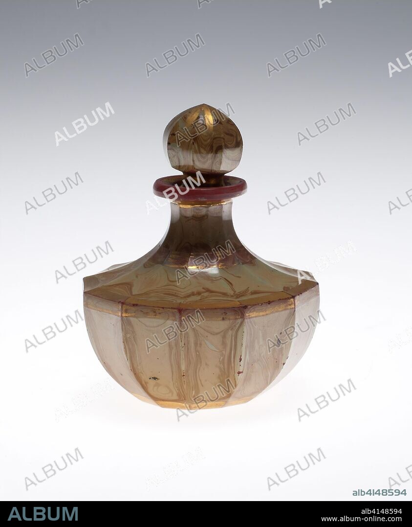 FRIEDRICH EGERMANN. Lithyalin Scent Bottle. Workshop of Friedrich Egerman; Bohemian, 1777-1864. Date: 1825-1835. Dimensions: 8.9 × 7 cm (3 1/2 × 2 3/4 in.). Glass; marbled opaque red and ochre, blown, cut, stained and gilded. Origin: Bohemia.