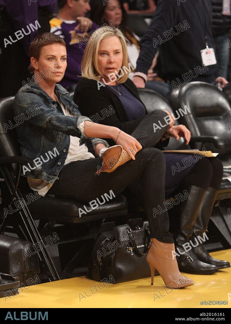 Jan. 11, 2013 - Los Angeles, CA, USA - Friday January 11, 2013; Charlize Theron and her mother Gerda Theron having a good time at the Lakers game. The Oklahoma City Thunder defeated the Los Angeles Lakers by the final score of 116-101 at Staples Center in downtown Los Angeles, CA. 11/01/2013