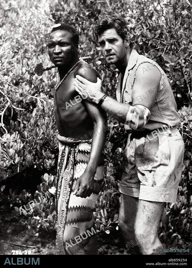 ANTHONY STEEL in WEST OF ZANZIBAR, 1954. Copyright EARLING STUDIOS.