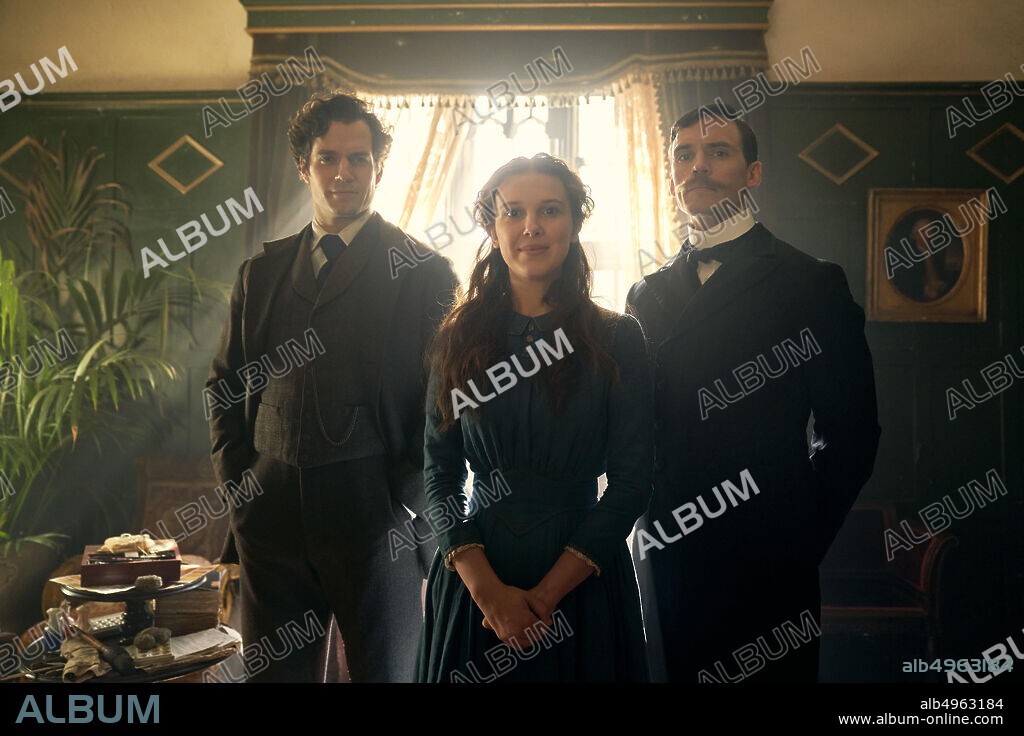 HENRY CAVILL, MILLIE BOBBY BROWN and SAM CLAFLIN in ENELA HOLMES, 2020, directed by HARRY BRADBEER. Copyright NETFLIX/LEGENDAY ENTERTAINMENT/PCMA PROD/WARNER BROS.