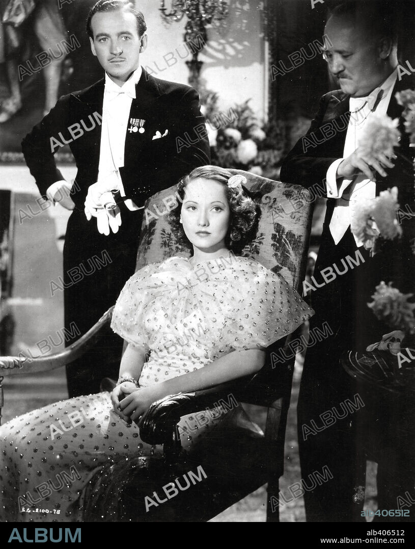DAVID NIVEN and MERLE OBERON in BELOVED ENEMY, 1936, directed by H. C. POTTER. Copyright SAMUEL GOLDWYN/UNITED ARTISTS.