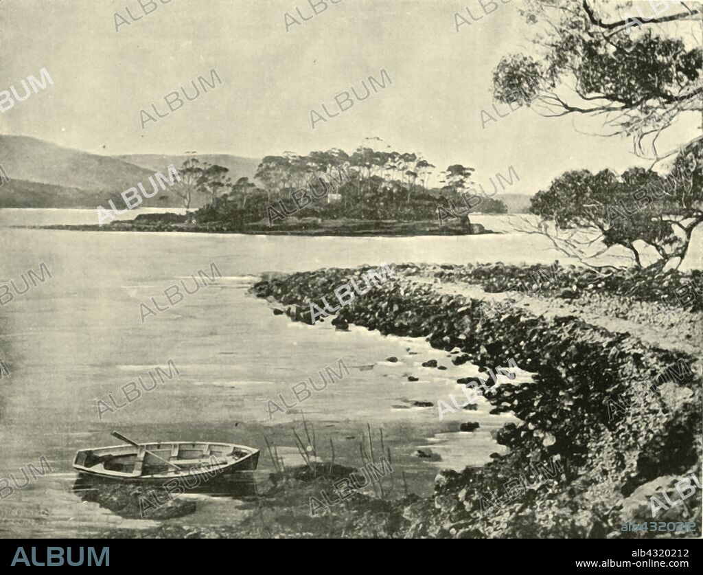 'Isle of the Dead, Port Arthur', 1901. Isle of the Dead, a cemetery for all who died in the prison camps at Port Arthur when it was a British penal colony between 1833 and 1877. From "Federated Australia". [The Werner Company, London, 1901].