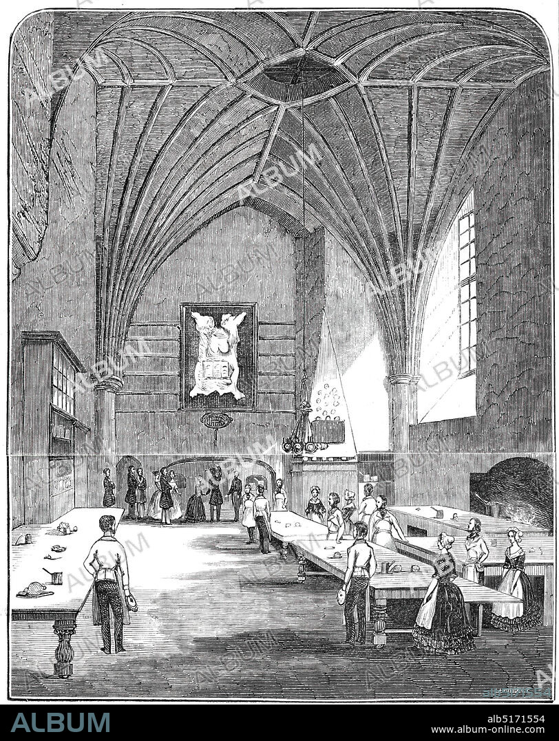 The kitchen at Burghley, 1844. Interior showing the great kitchens at Burghley House, near Stamford, Lincolnshire. The house was built in the 16th century. Here we see Queen Victoria and Prince Albert visiting the main kitchen: '...a noble room situated on the south side of a spacious court. It stands at the east end of the mansion, and measures 48 feet by 30; the roof is very lofty, and has a groined ceiling, of earlier style even than the old mansion. At one end is a large painting of a carcase of beef - an exhibition of the true ensign armorial of English hospitality...'. From "Illustrated London News", 1844, Vol V.