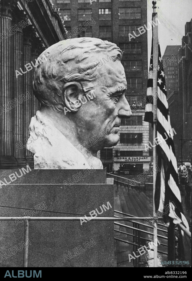 New Bust Of President Roosevelt.This thirteen-ton bust of President Franklin D. Roosevelt was unveiled in front of the New York City Post Office at the opening of the fund-raising campaign of the Foundation for Infantile Paralysis. It was designed by Stanley Matineau, a private in the U.S. Army. July 5, 1943. (Photo by U.S. Office Of Information Picture).