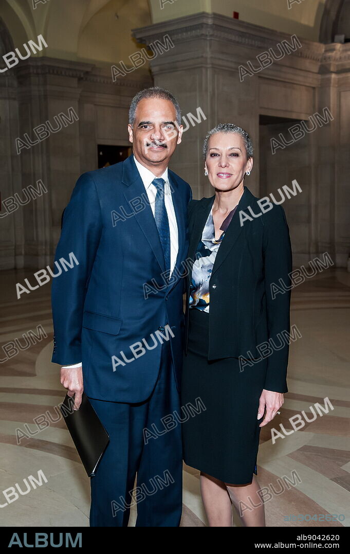 Photograph of Eric Holder and his wife Sharon Malone (1959-). Eric Himpton Holder Jr. (1951-) an American lawyer and former Attorney General of the United States.