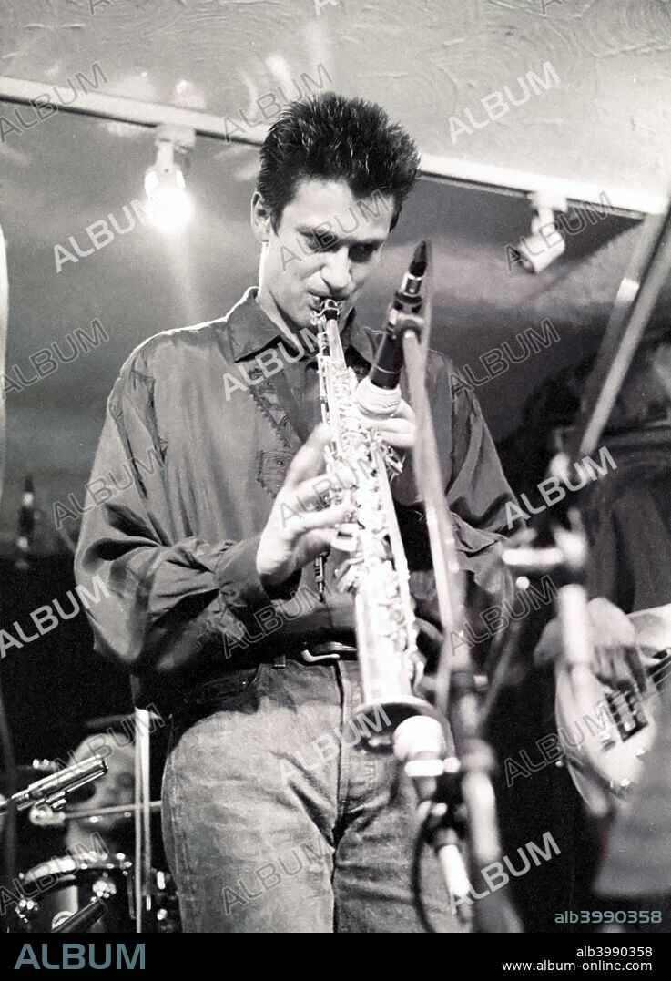 Dave O'Higgins, saxophonist, Tenor Clef, London, 1991. O'Higgins was the busking saxophone player in the film The Return of Mr Bean.