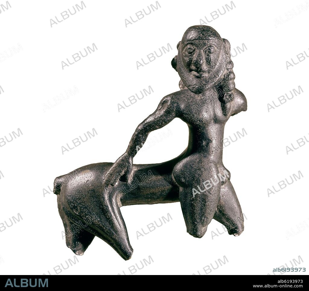 CENTAURO DE LOS ROLLOS PROCEDENTE DE CAMPO DE CARAVACA (MURCIA) -  S VI AC - BRONCE.