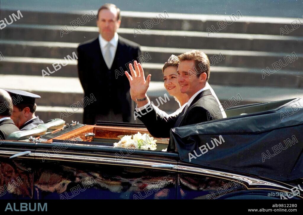 October 3, 1997. Wedding of Infanta Cristina and Iñaki Urdangarín: in the Image, the couple during their car ride through the city of Barcelona after having offered their Bride's bouquet to the Patroness of Barcelona in the Basilica of La Merced.
