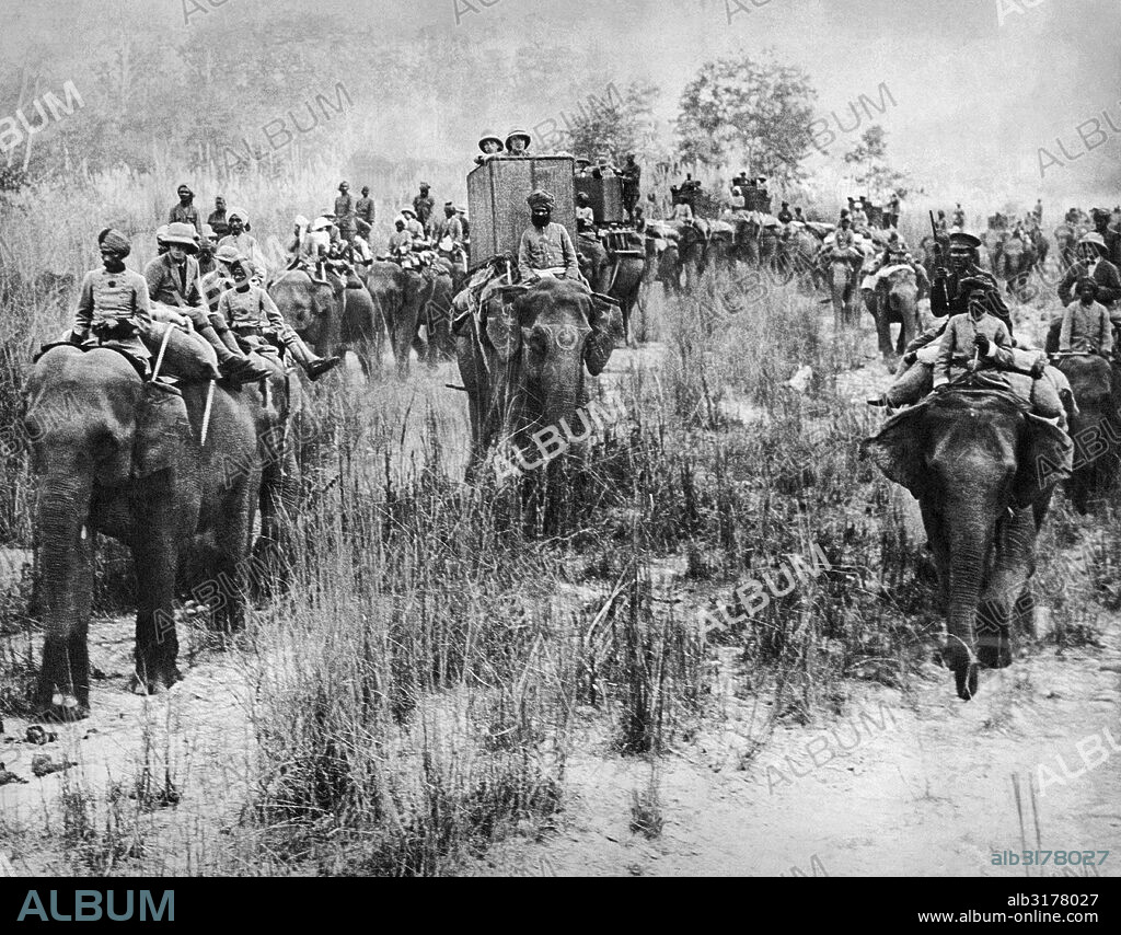Nepal:  January 29, 1922 The Prince of Wales (left) perched atop an elephant leading a tiger hunting expedition during his royal tour of India.   © Underwood Archives / The Image Works.