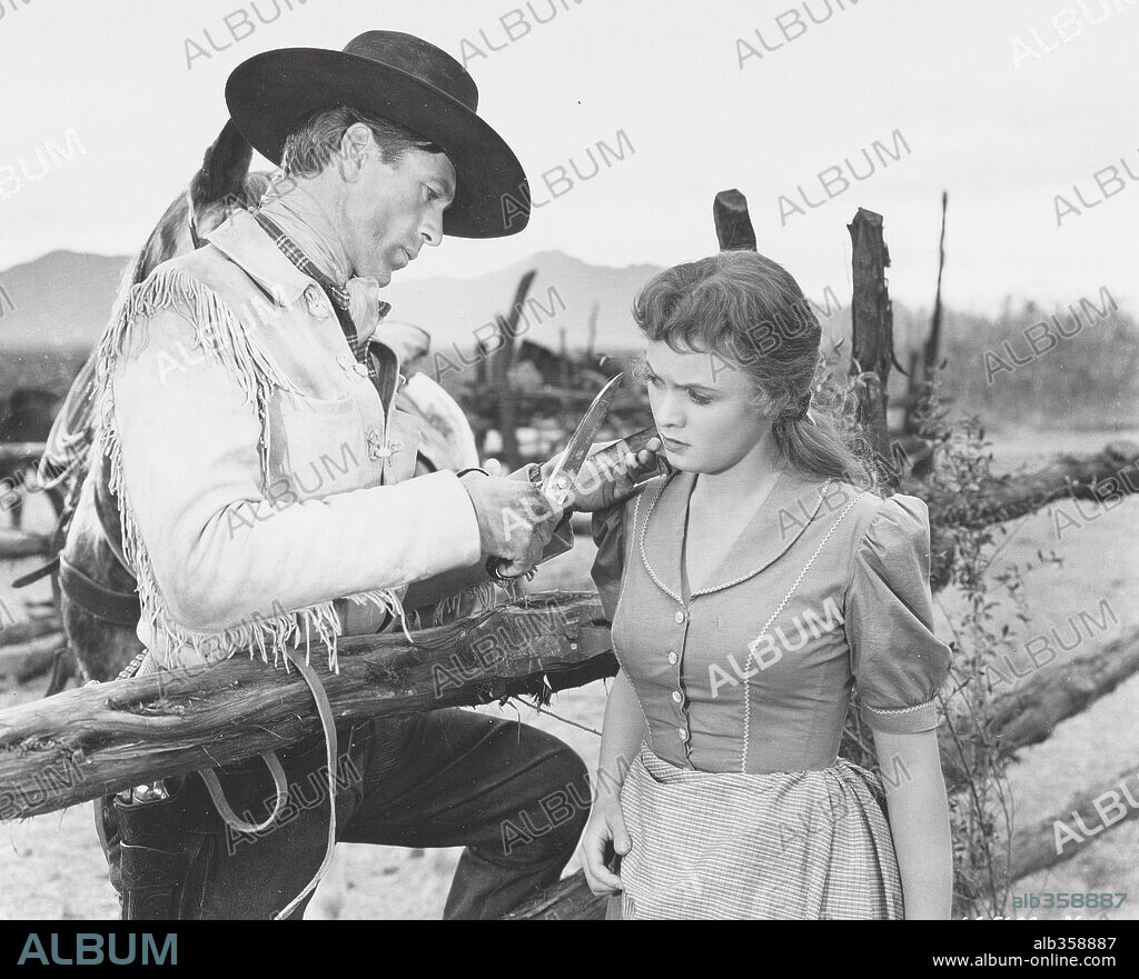 DORIS DAVENPORT and GARY COOPER in THE WESTERNER, 1940, directed by WILLIAM WYLER. Copyright UNITED ARTISTS/SAMUEL GOLDWYN.