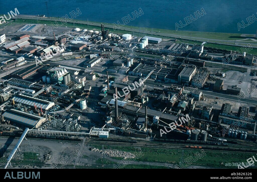 Aerial photo of the Hooker Chemical plant in the early 1980's. Hooker Chemical used the Love Canal area as a dumping ground in the 1950's. The Love Canal community was erected on top of the dump, resulting in a multitude of cancers and birth defects in the residents years later.