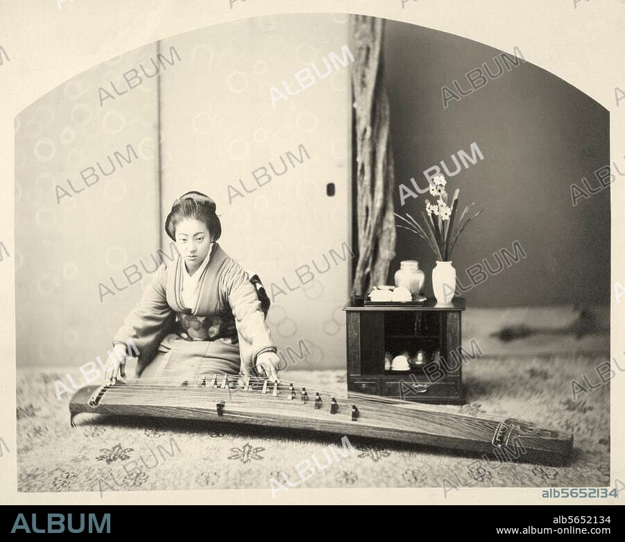 Ethnology / Japan. Geisha with koto (string instrument, similar to a zither). Photograph, c. 1890.