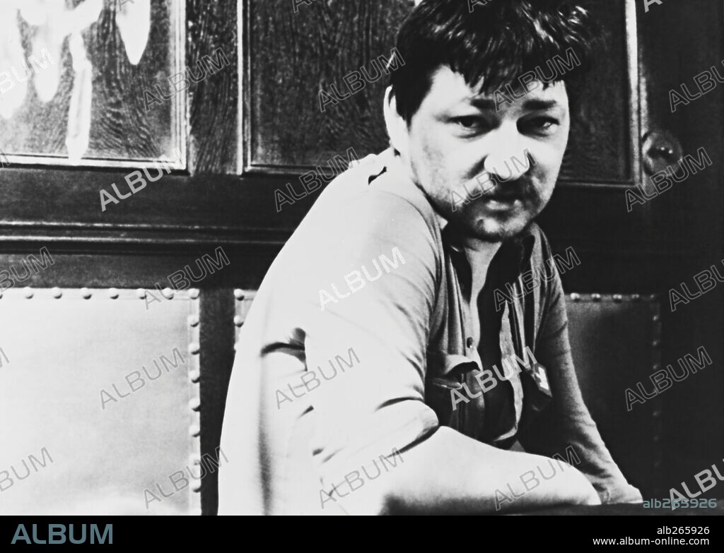RAINER WERNER FASSBINDER in THE THE THIRD GENERATION, 1979 (DIE DRITTE GENERATION), directed by RAINER WERNER FASSBINDER. Copyright NEW YORKER FILMS.