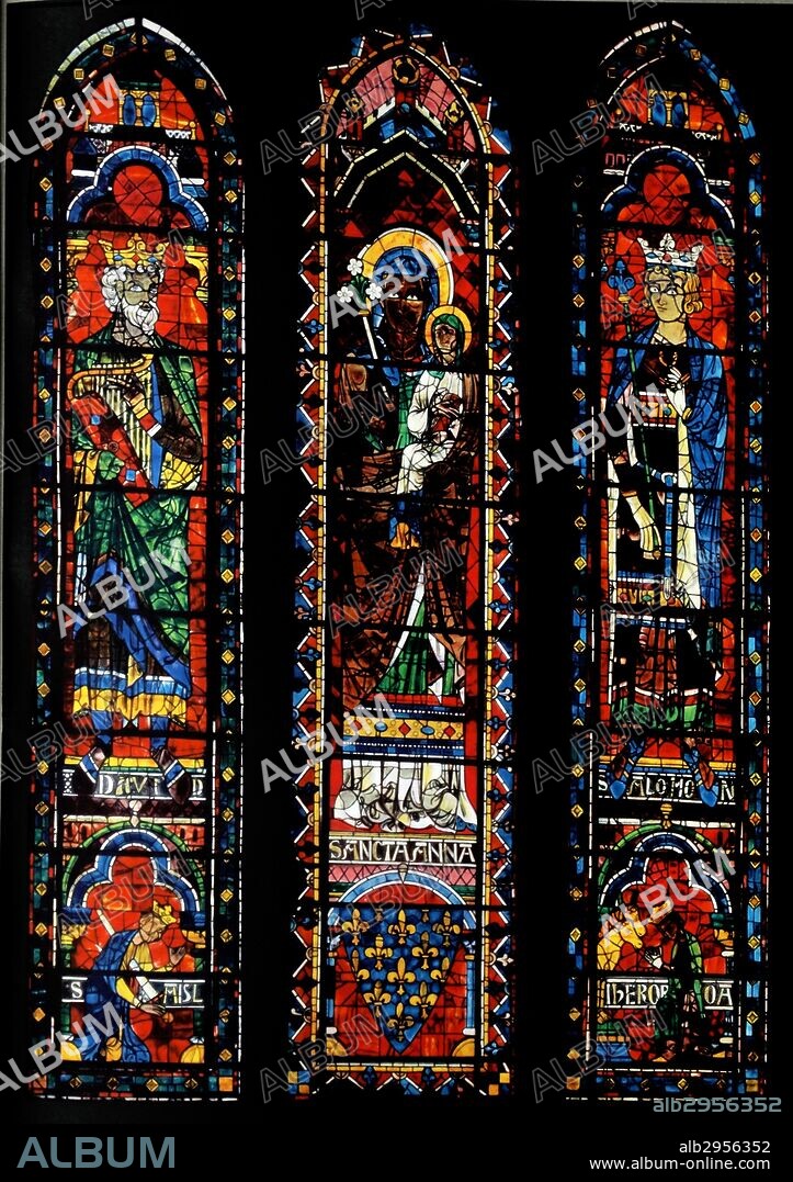 Stained glass windows from the North Transept of Chartres Cathedral, France. Shows King David with harp; St Anne with the infant Virgin Mary and King Solomon; 13th century.