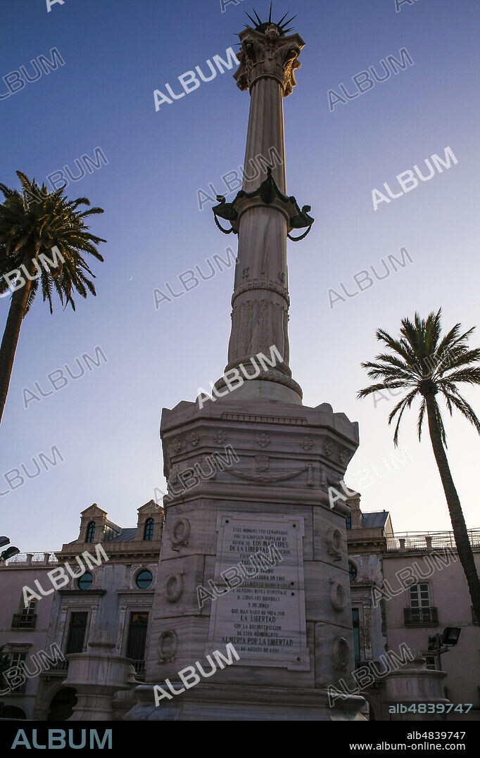 Almería, Andalusia, Spain, Europe.. Plaza de la Constitucion or Plaza Vieja. Monument to the Martyrs of Liberty (Martires de la libertad), also known as the monument to the Coloraos or Pingurucho, is a commemorative column inaugurated in 1870 and restored in 1988.