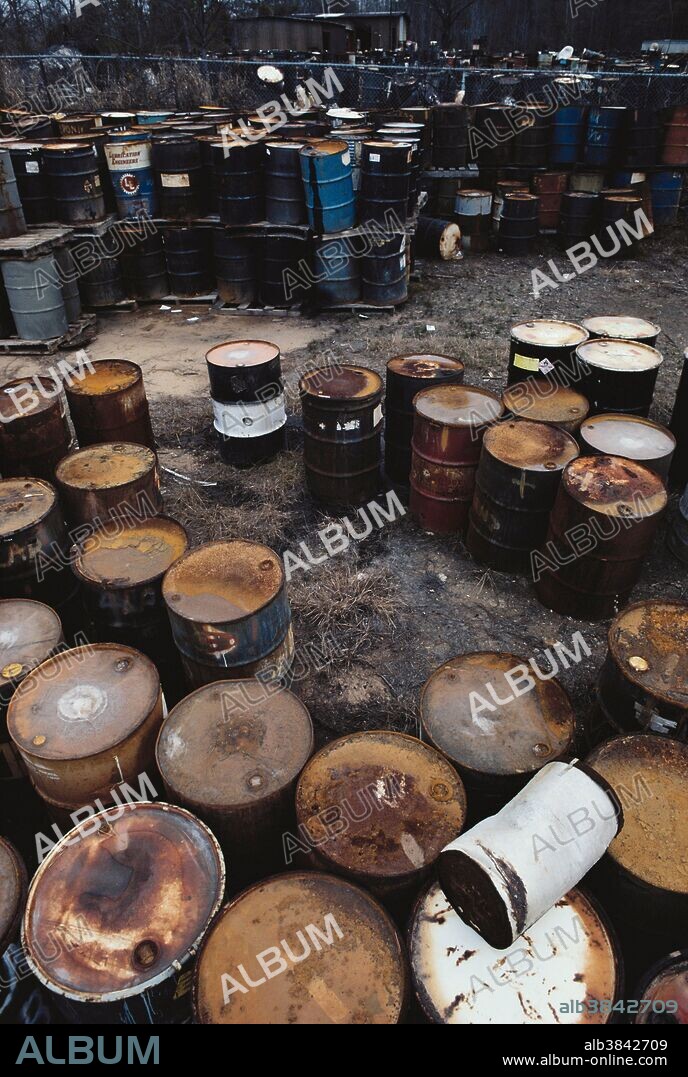 Barrels of hazardous chemical waste at South Carolina Recycling and Disposal, Inc. (SCRDI) Bluff Road Site, south of Columbia, South Carolina. The site was listed as an EPA Superfund site in 1981, meaning it required long-term clean-up. The property contained about 7,200 drums of toxic, flammable, and reactive wastes, as well as numerous smaller containers, plus two small ponds once used for lime slurry disposal by an acetylene manufacturer. Air, ground water, and surface water were all contaminated.