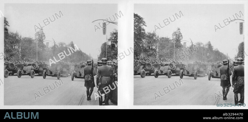 The Pak-Verbande drive past Hitler in Warsaw.