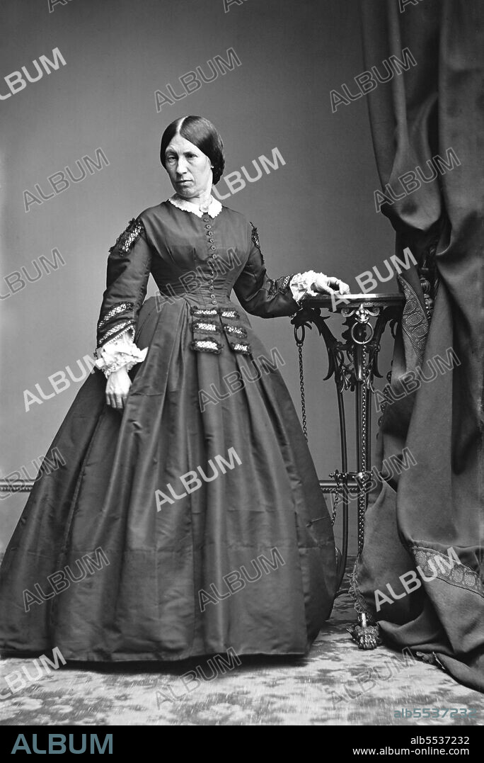 Julia Dent Grant (1826-1902), U.S. First Lady and wife of U.S. President Ulysses S. Grant, full-length standing Portrait, Mathew Brady Studio, 1864.