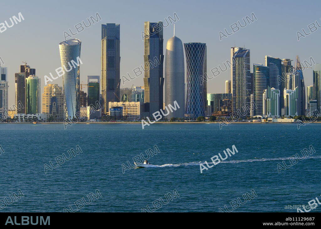 Modern skyline including Al Bidda Tower, Palm Towers, Burj Qatar and Tornado Tower, Doha, Qatar, Middle East.