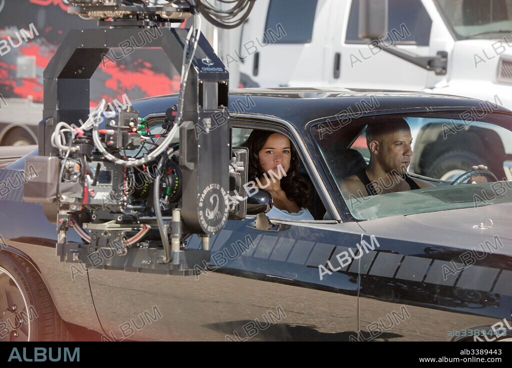 MICHELLE RODRIGUEZ and VIN DIESEL in FURIOUS SEVEN, 2015, directed by JAMES WAN. Copyright UNIVERSAL PICTURES/DENTSU/FAST 7 PRODUCTIONS/ONE RACE FILMS.