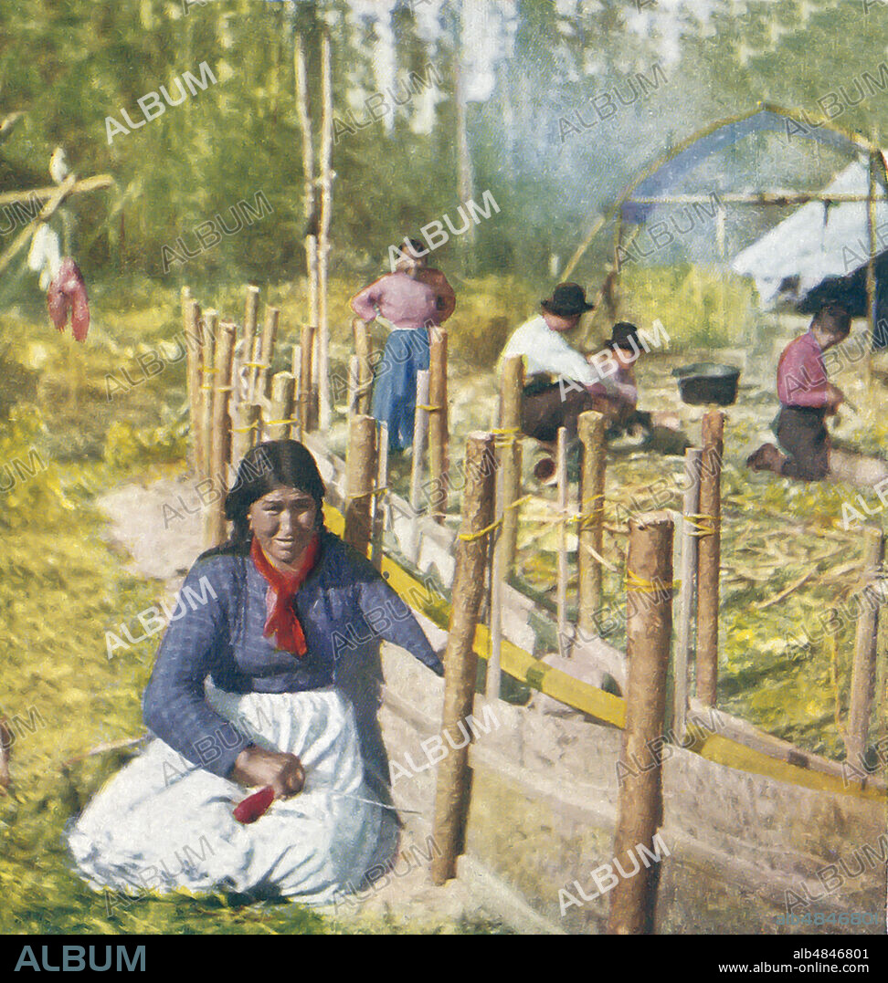 Stereoscope 1898 T.W. Ingersoll. A hand coloured photograph. Chippewa Squaw making a birch canoe.