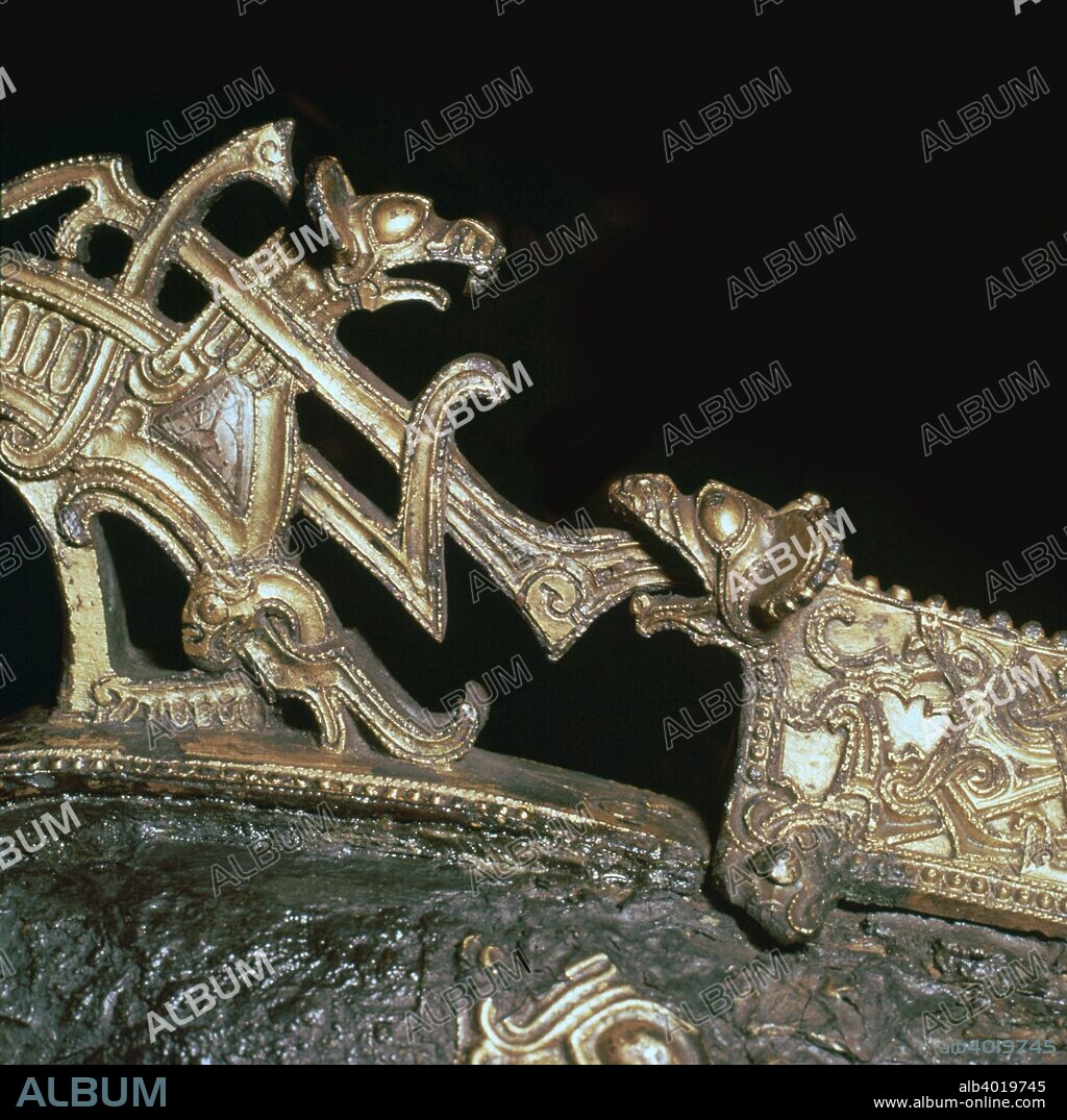 Detail of a gilded bronze Viking neck-yoke for a pair of horses, from a Viking grave at Sollestad, funen, Denmark. From the National Museum's collection in Copenhagan, 10th century.