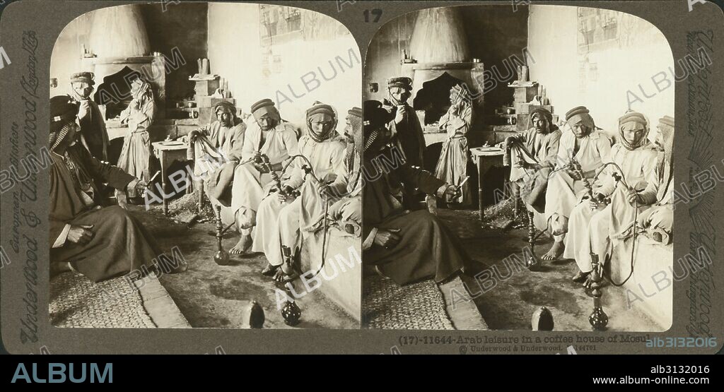 Mosul, Iraq:  c. 1900 A stereocard of Arab men at their leisure in a coffee house in Mosul.
