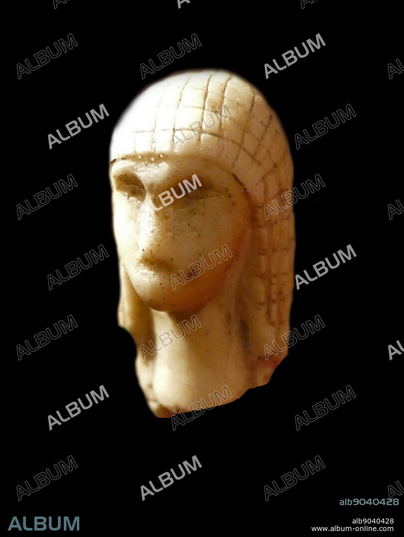 Photograph of the Venus of Brassempouy (la Dame de Brassempouy), a fragmentary ivory figurine from the Upper Palaeolithic. It was discovered in a cave at Brassempouy, France in 1892. About 25,000 years old, it is one of the earliest known representations of a human face. Dated 27,000 BC.