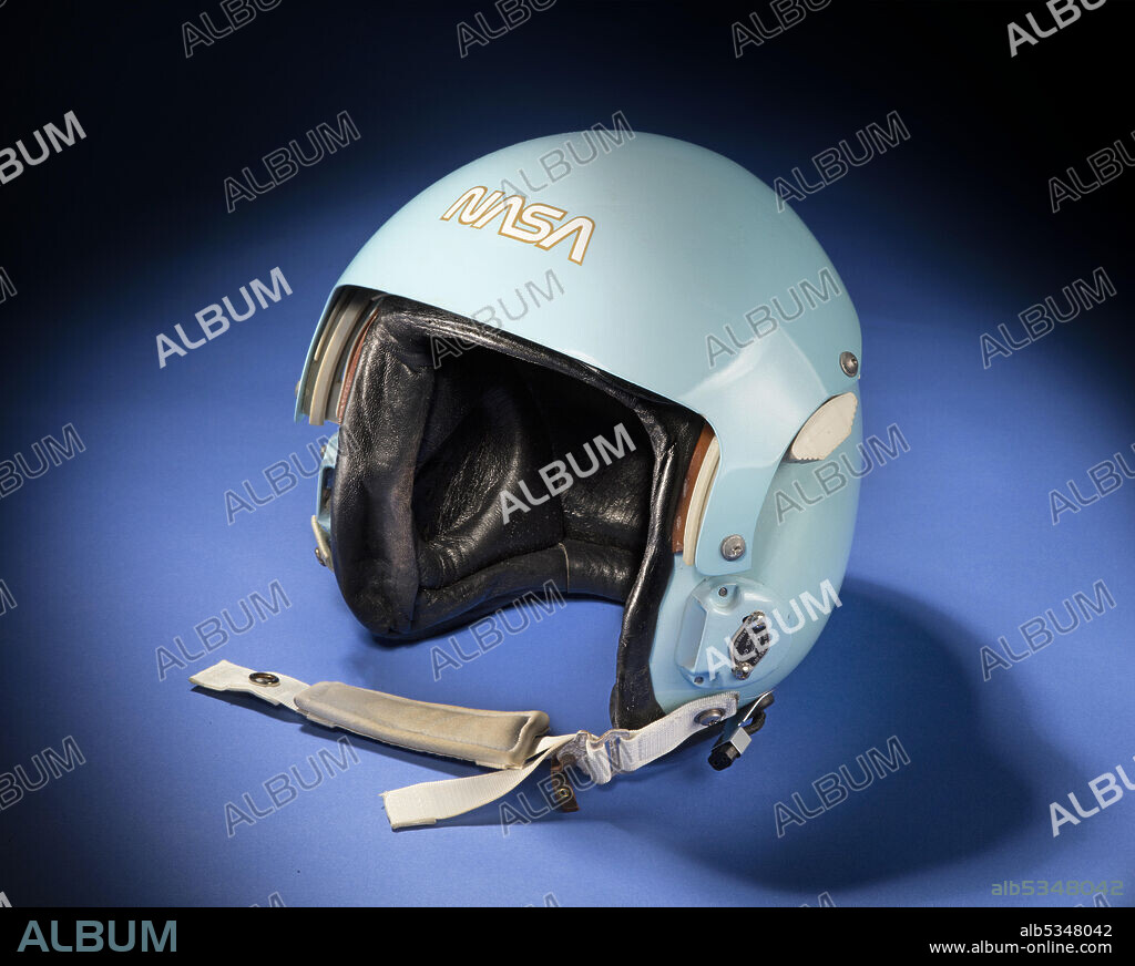 SIERRA ENGINEERING CO.. Aviator helmet belonging to Sally K. Ride, ca. 1983. Dr. Sally K. Ride became the first American woman in space when she flew on the STS-7 shuttle mission in 1983. As a scientist astronaut rather than a pilot, Ride trained for flight in the backseat of a Northrop T-38 training jet, learning navigation and communication procedures. This is one of the helmets she wore on those flights. She so enjoyed the experience of flying that she took private lessons and earned her pilot license.