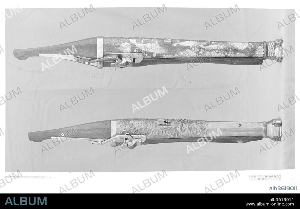 Hand Cannon. Culture: Japanese. Dimensions: L. 37 in. (94 cm). Gunsmith: Inscribed by Kazuki Nobumichi (Japanese, active late 18th-early 19th century). Date: late 18th-early 19th century.
The decoration on the barrel shows carp ascending a waterfall, symbolic of success in life.