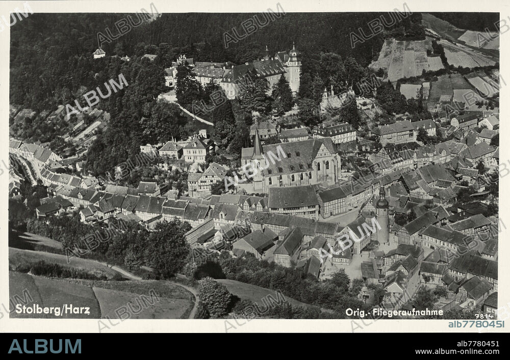 Stolberg (Harz), (Saxony-Anhalt, Germany). - "Stolberg / Harz". - (City view from the south with the castle and church of St. Martin). Photo postcard (aerial view), anonymous, undated (1930s), mounted. From a private photo album, Germany, 1930s, with views from Halberstadt, Quedlinburg, Havelberg and Stolberg. Private collection.