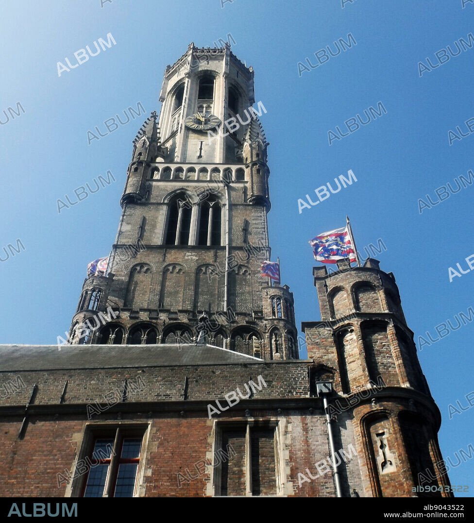 The belfry of Bruges, or Belfort, is a medieval bell tower in the historical centre of Bruges, Belgium. One of the city's most prominent symbols, the belfry formerly housed a treasury and the municipal archives, and served as an observation post for spotting fires and other danger. A narrow, steep staircase of 366 steps, accessible by the public for an entry fee, leads to the top of the 83-metre-high building, which leans about a metre to the east.