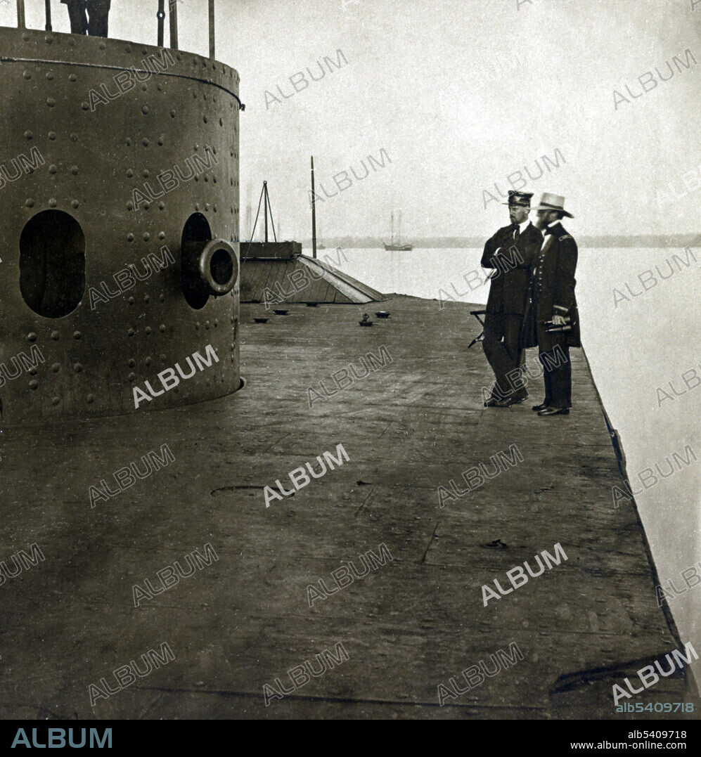 Deck and turret of USS Monitor. USS Monitor was an iron-hulled steam-powered ironclad warship built for the Union Navy during the American Civil War, the first such ship commissioned by the Navy. The unique design of the ship, distinguished by its revolving turret which was designed by American inventor Theodore Timby, was quickly duplicated and established the monitor class and type of armored steam-powered warship built for the American Navy in the next several decades. The remainder of the ship was designed by the Swedish-born engineer and inventor John Ericsson. Cropped stereograph by James F. Gibson, July 9, 1862 (cropped and cleaned).