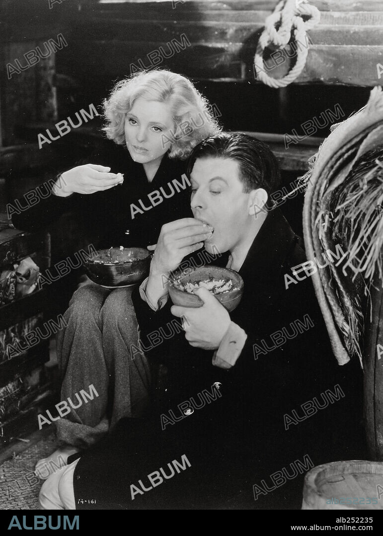 HENRY KENDALL and JOAN BARRY in EAST OF SHANGHAI, 1931 (RICH AND STRANGE), directed by ALFRED HITCHCOCK. Copyright BR INTERNATIONAL PICTURES.