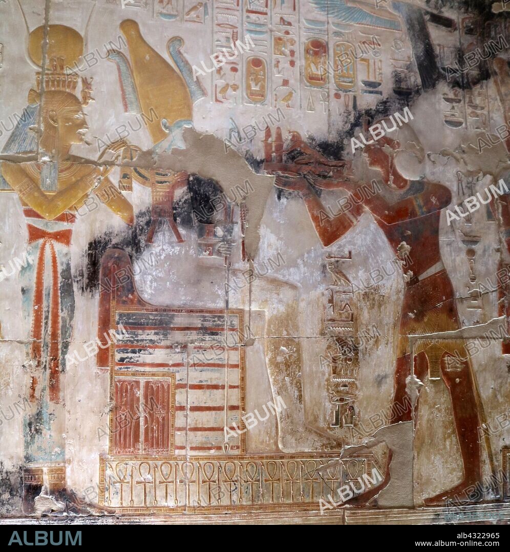 Abydos, one of the oldest cities of ancient Egypt, King Seti I, Presenting offering to Osiris and Isis.