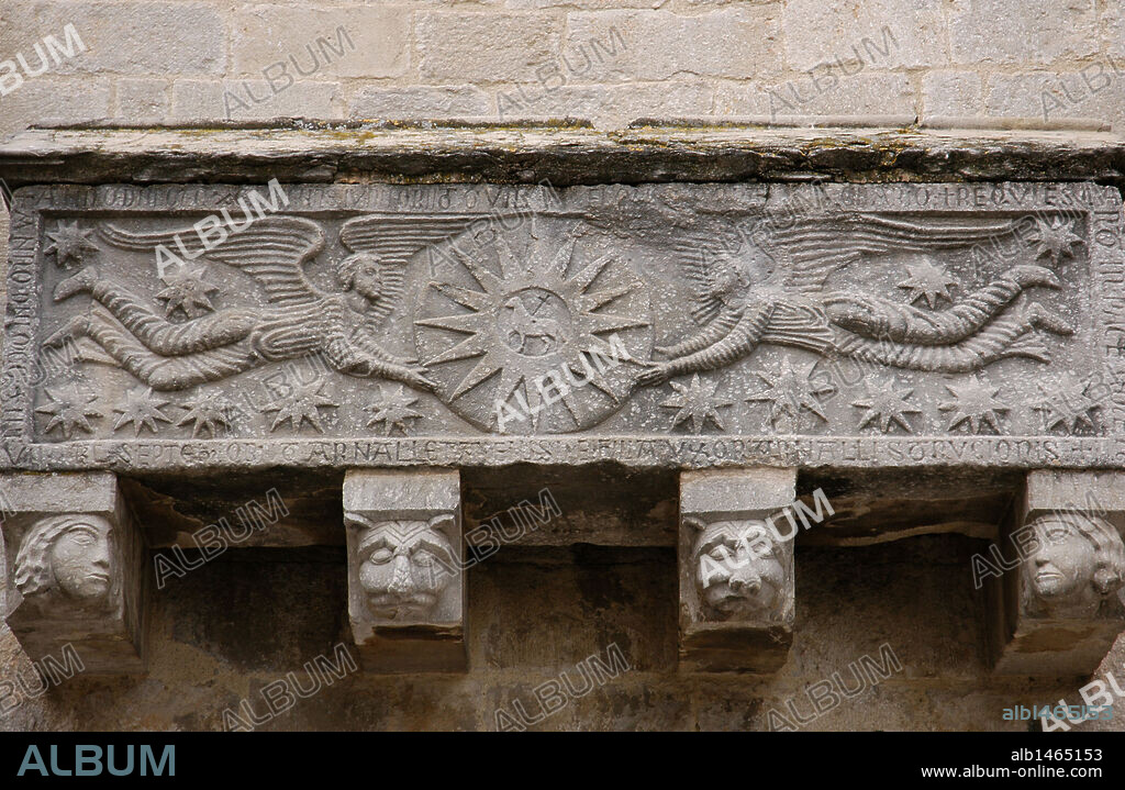 Early Christian Art. Spain. Catalonia. Girona. Collegiate Church of St. Felix. Replica of the sarcophagus which is kept inside the church. It belonged to the Sitjar family. Outside. Wall of the South Nave. On the front, there are two angels holding a circle with a Sun and the Agnus Dei inside.