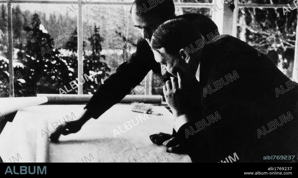 Adolf Hitler with Albert Speer. The Nazi architect Albert Speer showing to the German Chancellor Adolf Hitler the urban plans for the new Berlin. Obersalzberg, 1930s.
