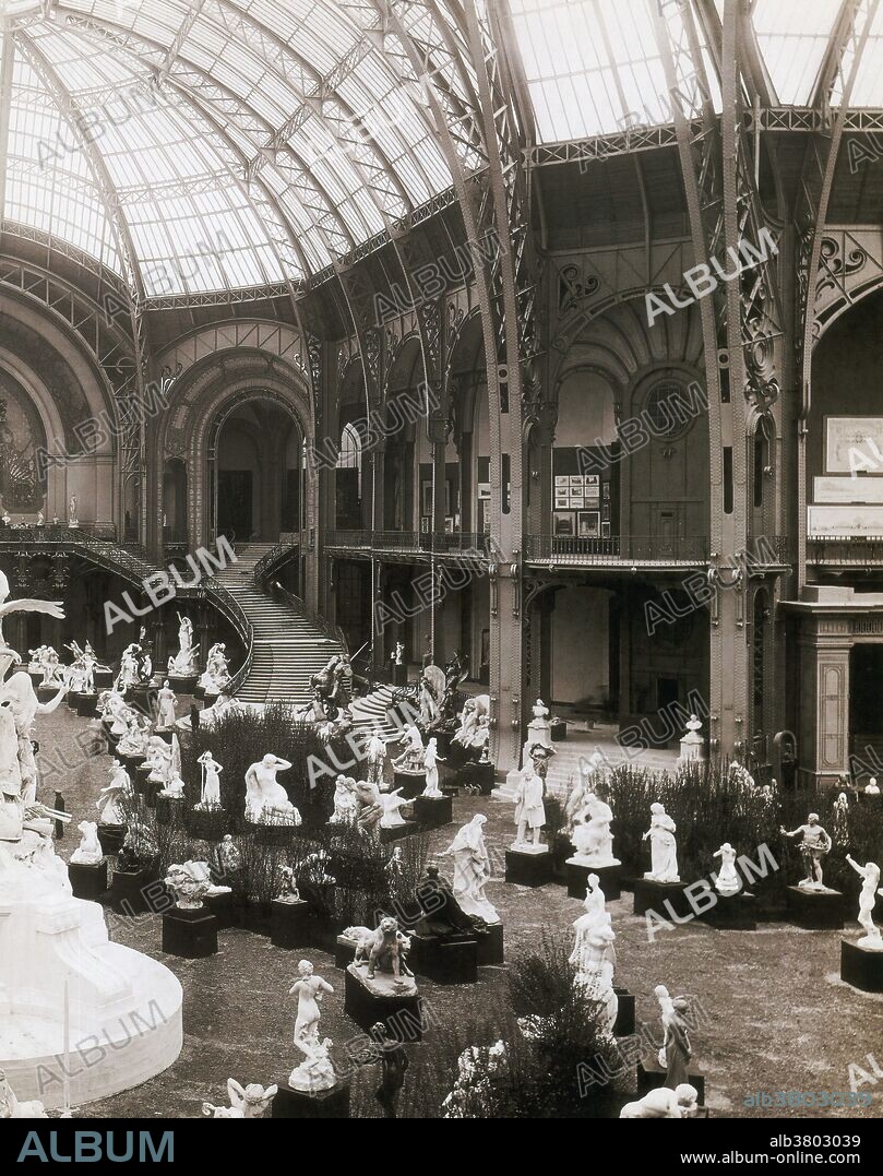 Exhibition of sculpture at the Grand Palais. Construction of the Grand Palais began in 1897 as part of the preparation works for the Universal Exposition of 1900. The main space, almost 780 feet long, was constructed with an iron, steel and glass barrel-vaulted roof that were necessary for large gatherings of people before the age of electricity. The main space was connected to the other parts of the palace along an east-west axis by a grand staircase in a style combining Classical and Art Nouveau.