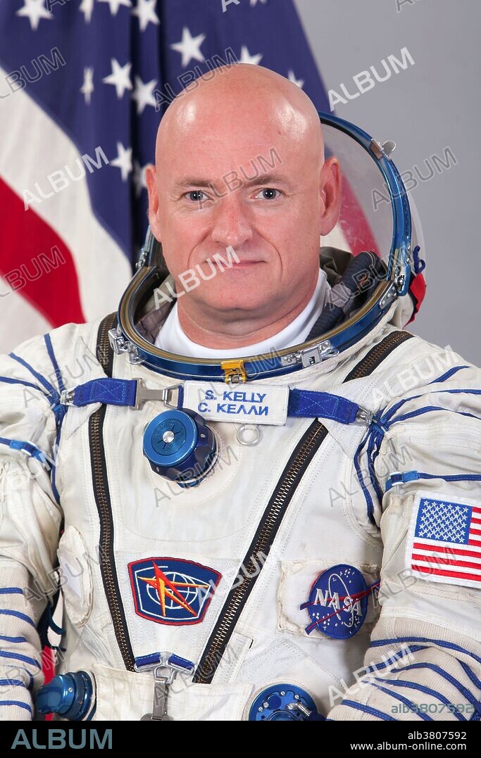 Official crew photograph of NASA astronaut Scott Kelly, Flight Engineer with the International Space Station's Expedition 43. Kelly will remain on board the International Space Station for a full year. Scott Joseph Kelly (born February 21, 1964) is an American astronaut, engineer and a retired U.S. Navy Captain. A veteran of three previous missions, Kelly was selected along with Mikhail Korniyenko in November 2012 for a special year-long mission to the International Space Station. Kelly commanded the International Space Station (ISS) on Expedition 26. He was Commander of the International Space Station on the one year mission until February 29, 2016, when he passed control to Timothy Kopra. In October 2015, he set the record for the total number of days spent in space by an American astronaut, 382. Kelly spent 340 consecutive days in space.